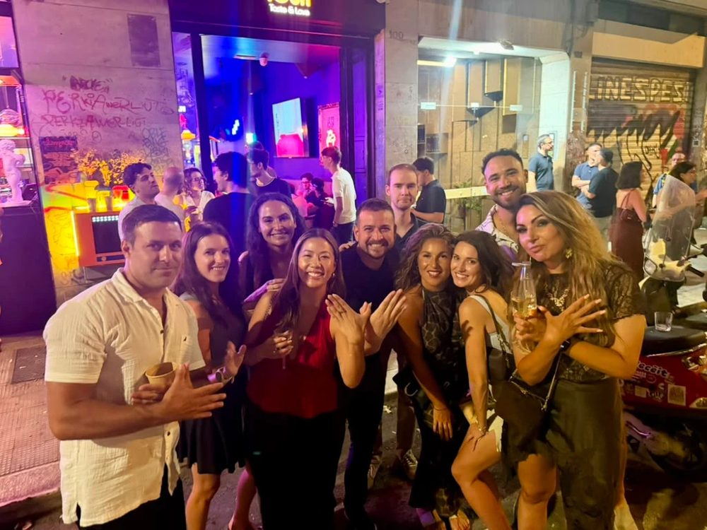 The crew on a bar street in Bari at night