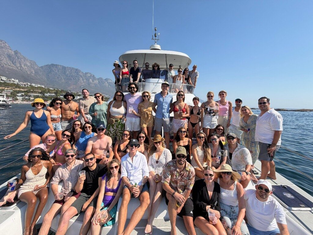 Flock members together on a catamaran off Cape Town